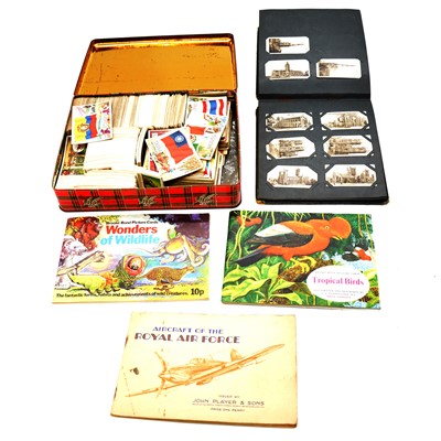 Lot 149 - A large collection of cigarette cards in albums, boxes and loose covering many subjects.