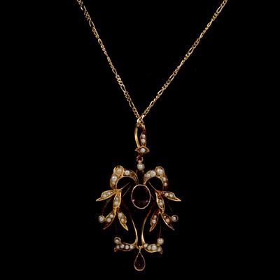 Lot 257 - An Edwardian garnet and pearl pendant and chain.