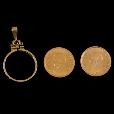 Lot 137 - Two Gold 1/10 Krugerrands and a 9 carat yellow gold pendant mount.