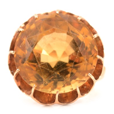 Lot 73 - A citrine dress ring.