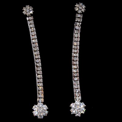 Lot 151 - A pair of diamond cluster drop earrings.