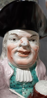 Lot 29 - Early 19th century pearlware Toby jug