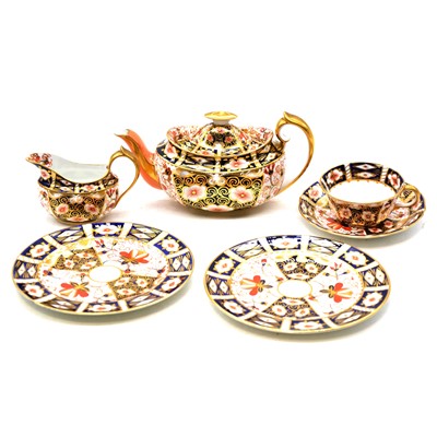 Lot 24 - Royal Crown Derby a harlequin Witches pattern tea service on cabaret tray