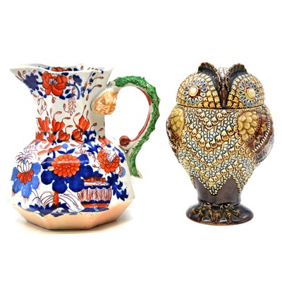 Lot 59 - A Doulton Lambeth stoneware owl tobacco jar and cover, and a Mason's Hydra jug.