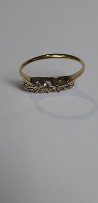 Lot 53 - A diamond five stone ring.