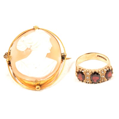 Lot 173 - A carved shell cameo brooch and garnet ring.