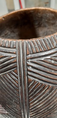 Lot 146 - African carved tribal vase