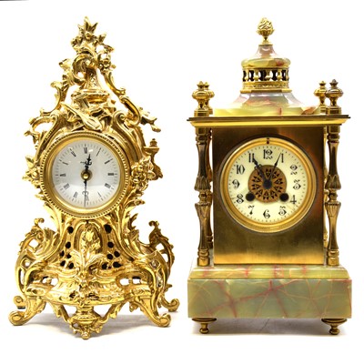 Lot 106 - Onyx and brass mantel clock, and another cast brass mantel clock with Quartz movement