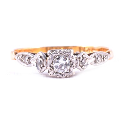 Lot 66 - A diamond solitaire ring with small 8 cuts to each side.