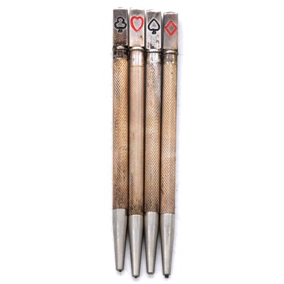 Lot 334 - A set of four white metal bridge pencils.