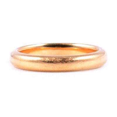 Lot 111 - A 22 carat gold wedding band.