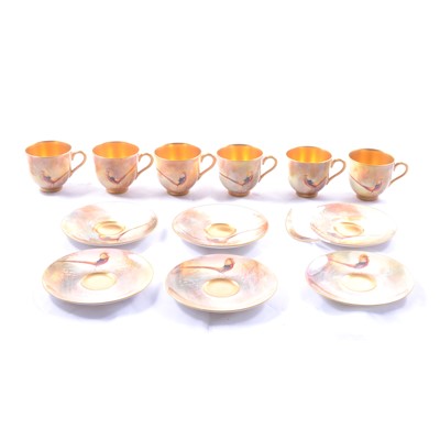 Lot 23 - Set of six Royal Worcester coffee cans and saucers by Walter Sedgley