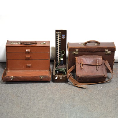 Lot 125A - Small doctor's travel case, another case, a satchel, and a vintage blood pressure gauge