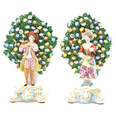 Lot 25 - A Pair of Chelsea Derby style porcelain bocage figurines, 20th century