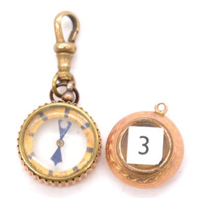 Lot 219 - Two 9ct gold miniature compass'