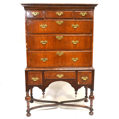 Lot 517 - Georgian walnut chest on stand