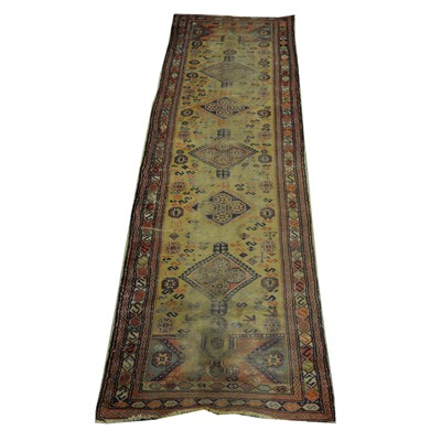 Lot 586 - Axminster style carpet, and a Persian runner, both heavily worn