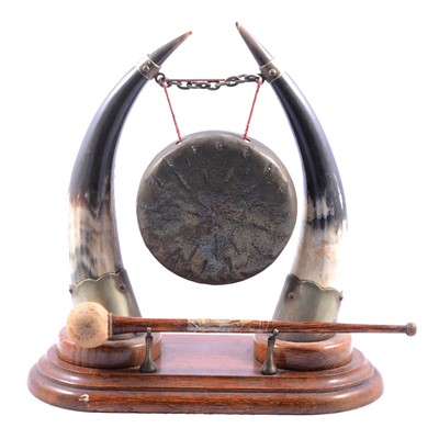 Lot 138 - Table gong with cow horns