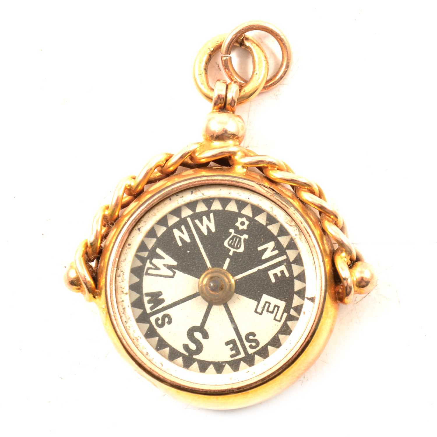 Compass Gold Casing Lot 147 - 9ct gold cased compass,