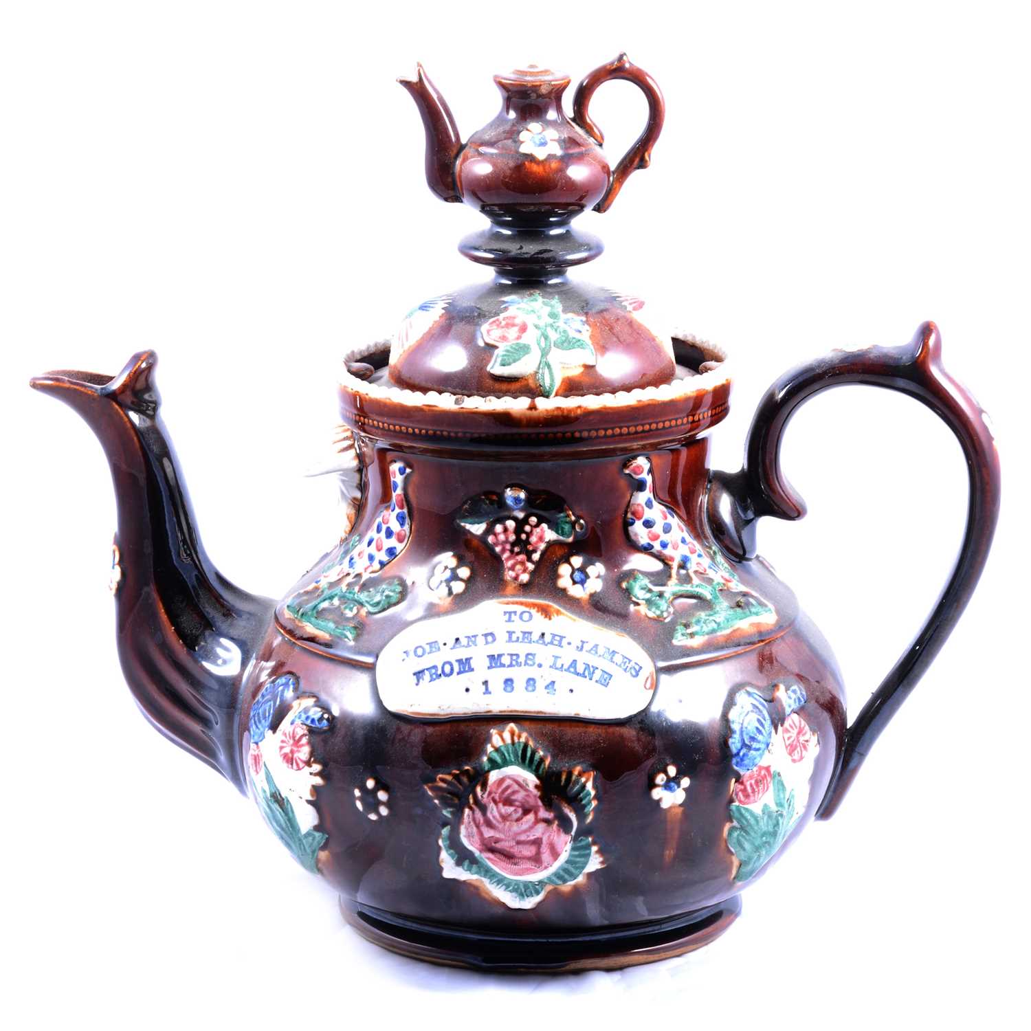 Lot 28 Victorian bargeware teapot, 'To Joe and Leah