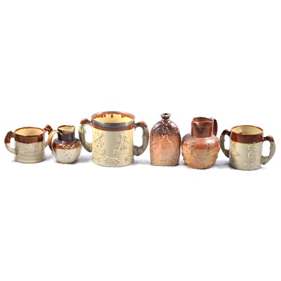 Lot 51 - Stoneware Loving cup with a silver collar other cups, jug and a flask