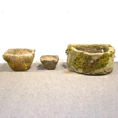 Lot 484 - Old stone bowfront sink, and two stone mortars.