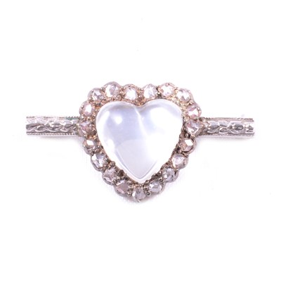 Lot 192 - A moonstone and diamond heart shaped brooch.