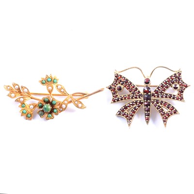 Lot 169 - A seed pearl and turquoise floral brooch, and a garnet set butterfly brooch.