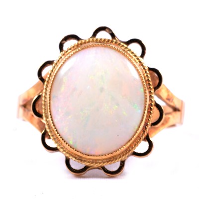Lot 10 - An opal dress ring.