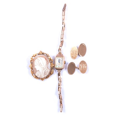 Lot 146 - Camerer Cuss - a lady's gold bracelet wristwatch, gold cufflinks, and carved shell cameo brooch.