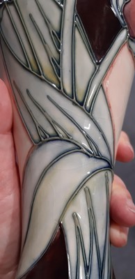 Lot 4 - Sally Tuffin for Moorcroft, a vase in the Red Tulip design.