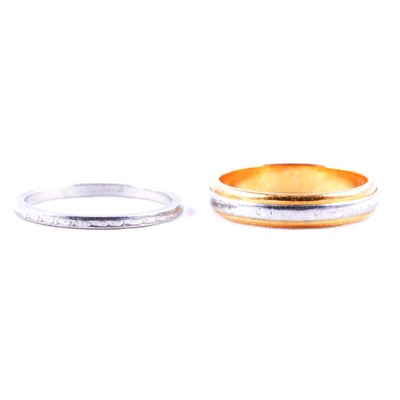 Lot 105 - Two gold and platinum wedding bands.