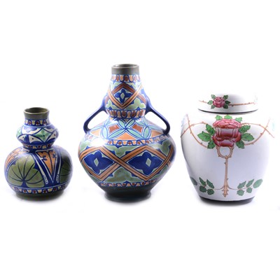 Lot 68 - Two Gouda pottery vases, and an early 20th century British ginger jar and cover