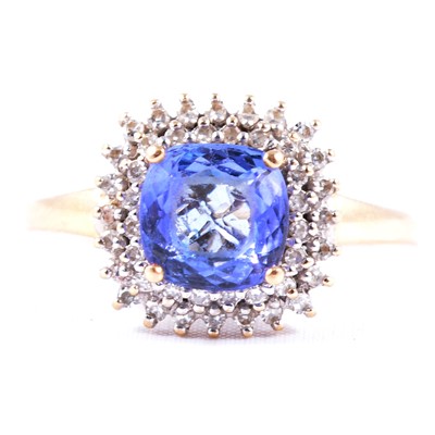 Lot 1 - A tanzanite and diamond cluster ring.