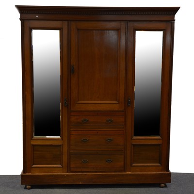 Lot 350 - Late Victorian walnut triple wardrobe