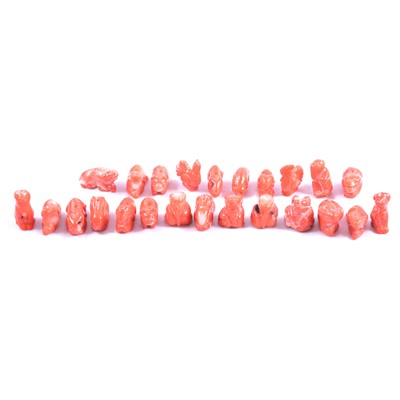 Lot 165 - Twenty-four carved coral beads in the form of Chinese zodiac animals.