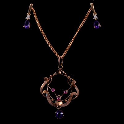 Lot 202 - An amethyst pendant and chain and pair of earrings.