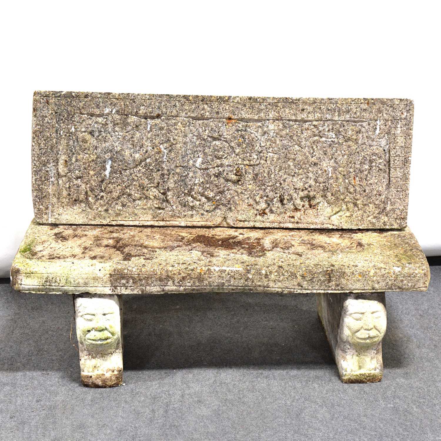 Lot 487 - Cast concrete garden bench