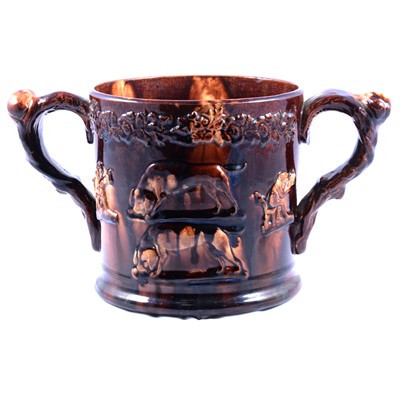 Lot 11 - Large Rockingham style treacle glazed frog mug