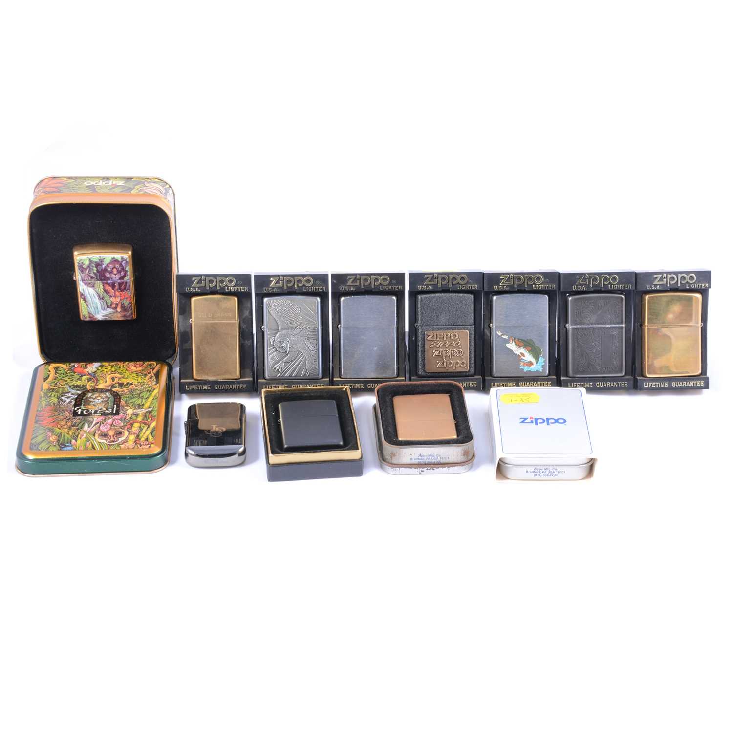 Lot 206 - 11 Zippo cigarette lighters, including the...