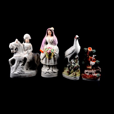 Lot 64 - A collection of Staffordshire flatback figures
