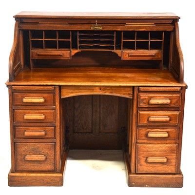 Lot 394 - American oak roll top desk