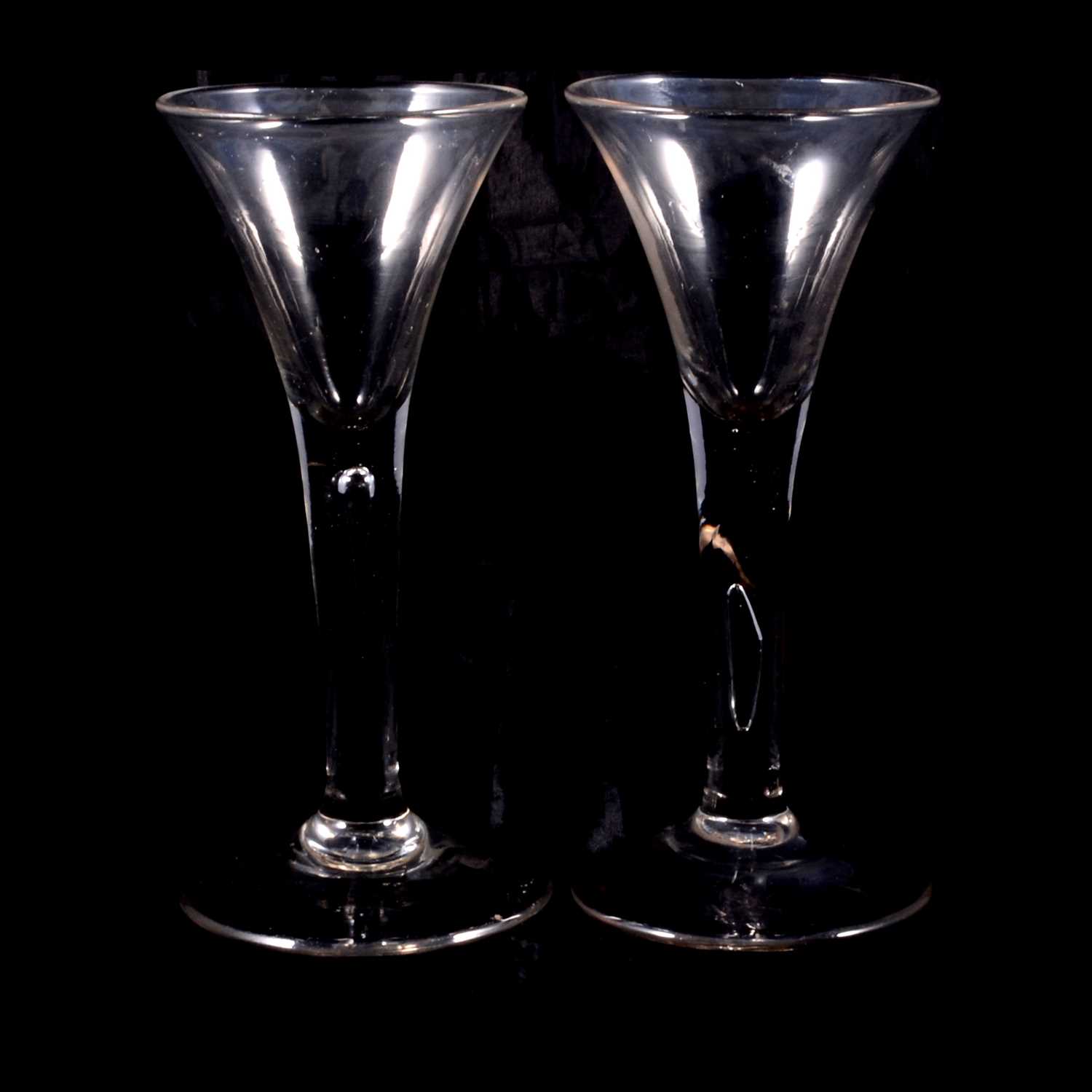 Lot 57 - Two similar wine glasses, mid 18th century