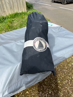 Lot 540 - 14ft Laser class dinghy sailboat, on trailer