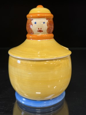 Lot 63 - Clarice Cliff, a novelty ‘Dutch Boy’ preserve pot and cover