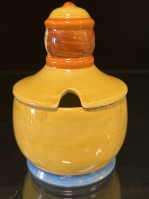 Lot 63 - Clarice Cliff, a novelty ‘Dutch Boy’ preserve pot and cover