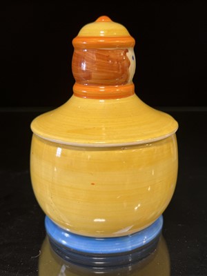 Lot 63 - Clarice Cliff, a novelty ‘Dutch Boy’ preserve pot and cover