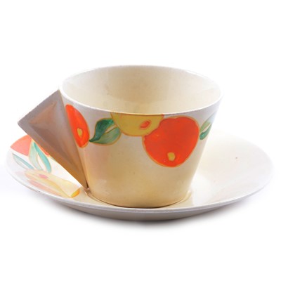 Lot 72A - Clarice Cliff, 'Citrus' a Conical shape tea cup and saucer
