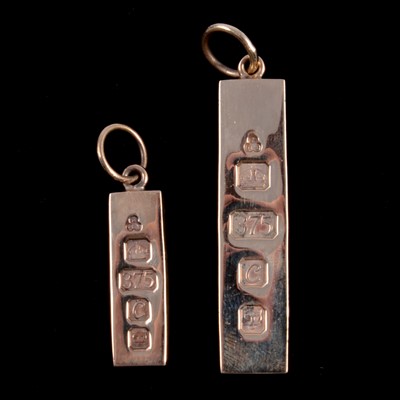 Lot 206 - Two 9 carat yellow gold ingot pendants.