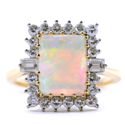 Lot 8 - An opal and diamond cluster ring.